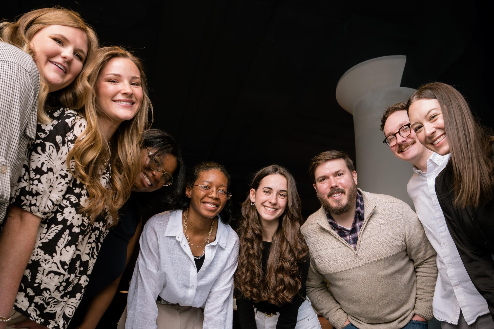 neon canvas team smiling